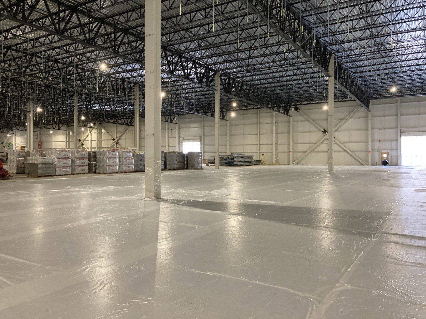 Concrete curing covers custom fit for a space