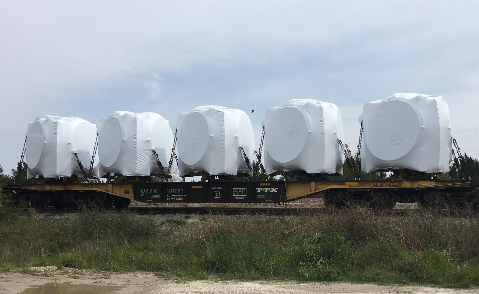 Large Equipment Protected with Covers Outside Ready for Transportation