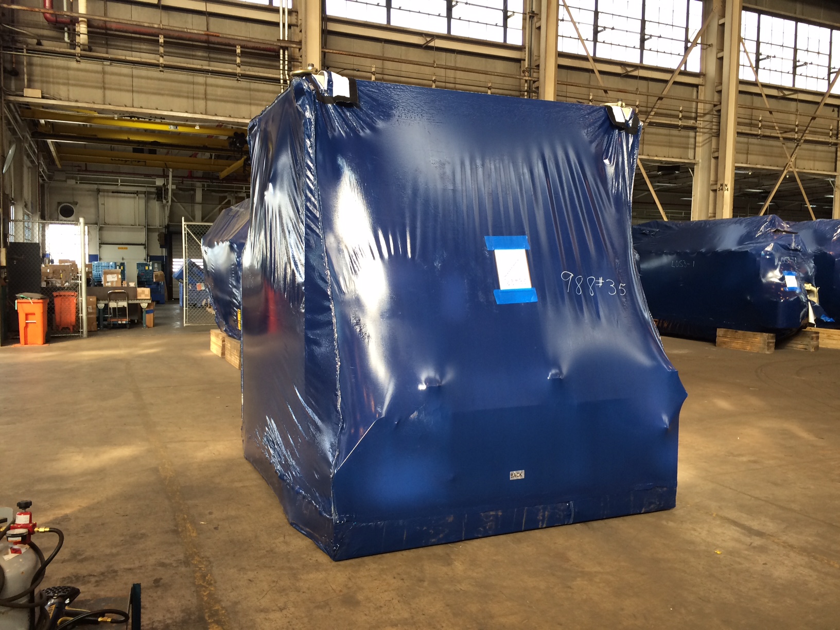 boxy vehicle with blue cover