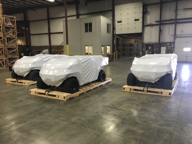 3 vehicles with covers