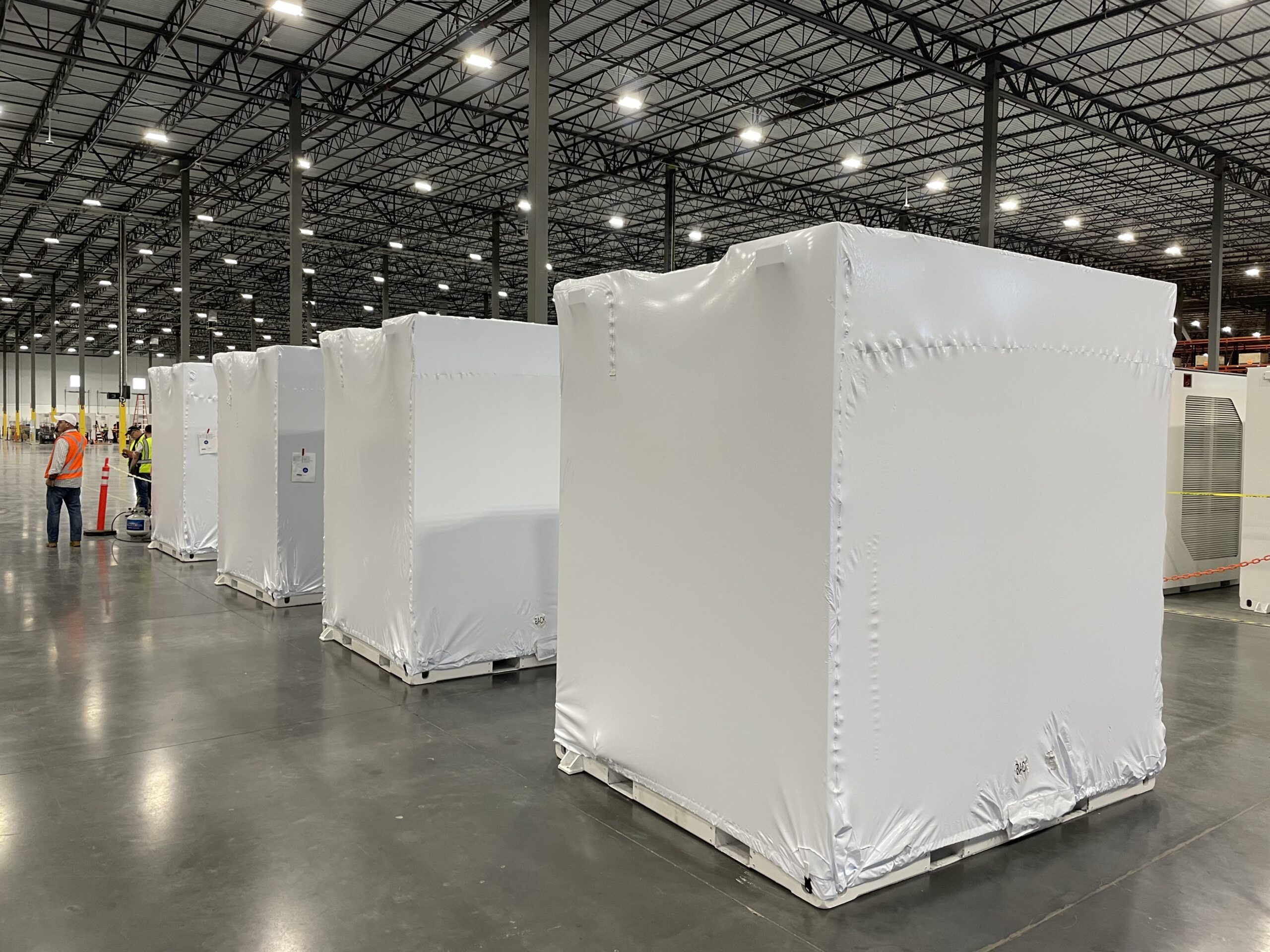 shorter square machinery with cover stored in warehouse