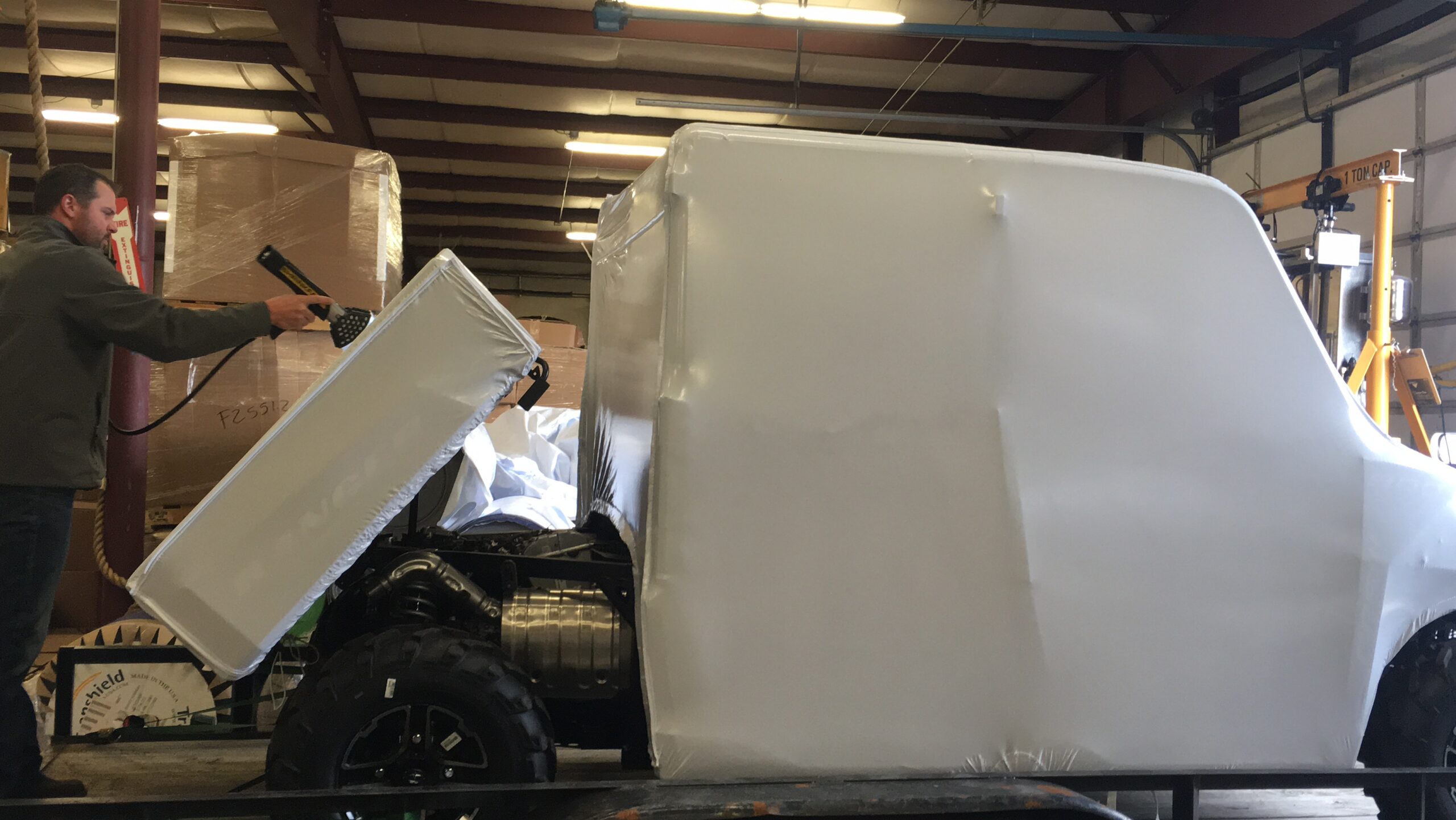 Truck Getting a Cover Wrapped on it